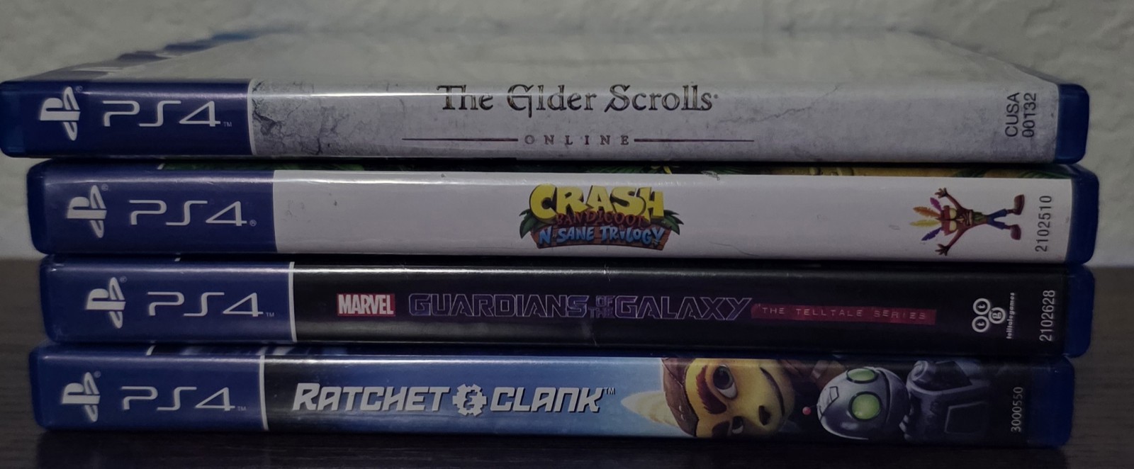 PS4 Game Lot of 4 Tested Working Crash Ratchet Elder Scrolls Guardians No...